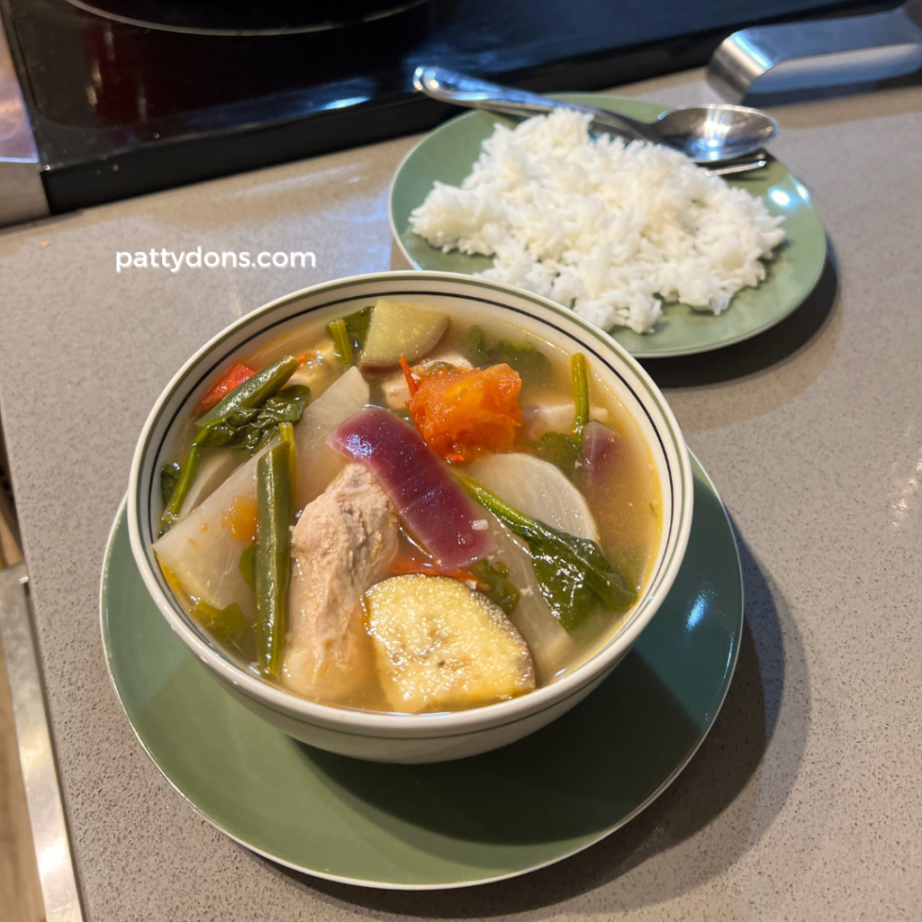 Pork sinigang served with steamed white rice