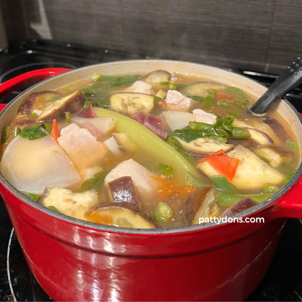 Pork sinigang cooked in red pot